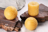 three pure beeswax candles